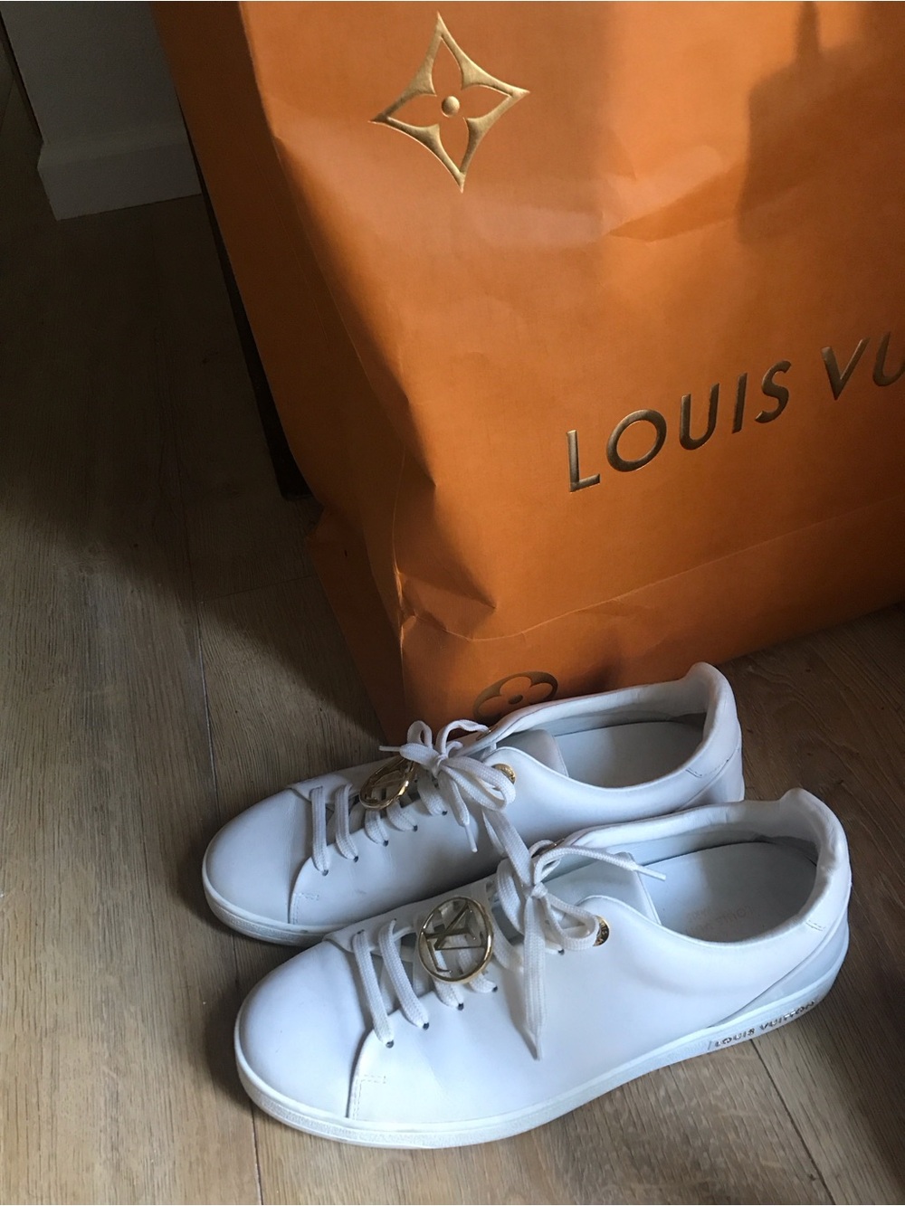 Louis Vuitton White Leather Sneakers with Gold LV Medallions - Picture 4 of 9